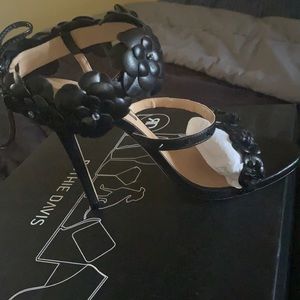 Black flower, & spike heeled shoe